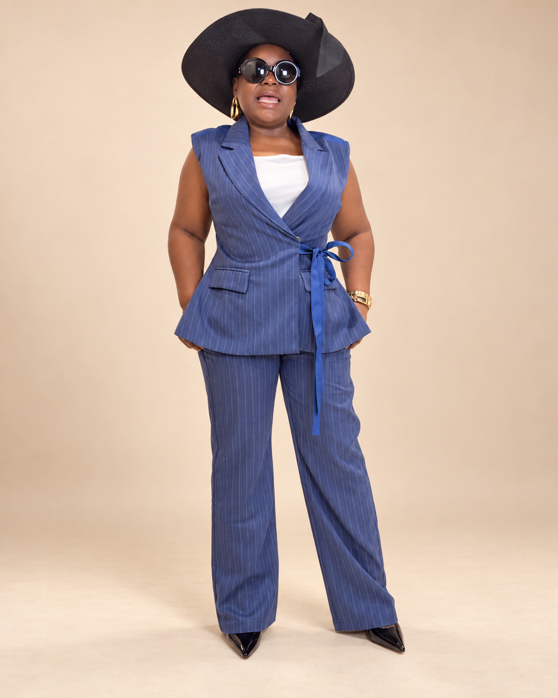 Ensemble blazer sans manches et pantalon large rayé bleu